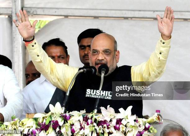 Chief Amit Shah addresses the public at a rally at GIC Ground on April 21, 2018 in Rae Bareli, India. Taking his party's fight against the Congress...