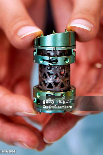 The end cleats and mesh of a Medtronic Inc. T2 Sceptor, which replaces a section of damaged vertebra and a disc in a human spine, is displayed at a...