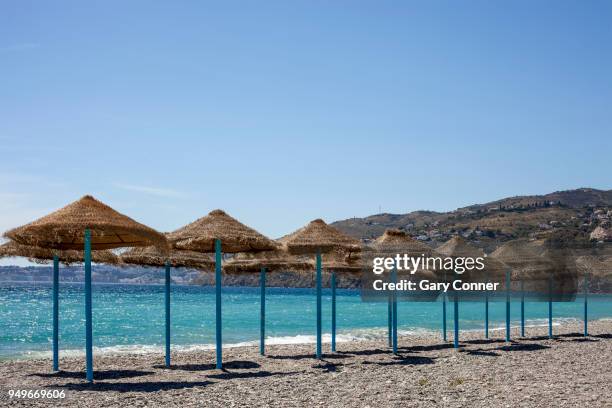 beach shades - salobreña stock pictures, royalty-free photos & images