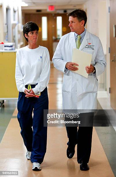James Eason, chief of transplantation at Methodist University Hospital, right, speaks with nurse Sharie Lewis in the hospital's transplant ward in...