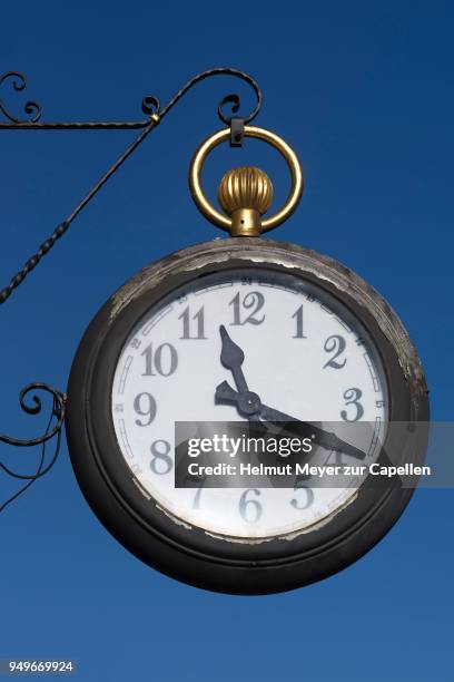 hanging shop sign as pocket watch at a watch shop, erlangen, middle franconia, bavaria, germany - erlangen stock pictures, royalty-free photos & images