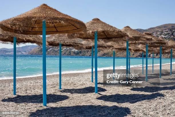 beach shades - salobreña stock pictures, royalty-free photos & images