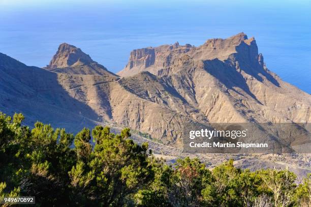 risco de tejeleche, view from los barranquillos in the garajonay national park, near vallehermoso, la gomera, canary islands, spain - risco stock pictures, royalty-free photos & images