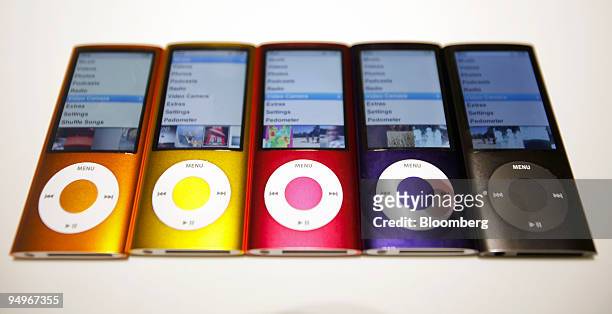 IPod Nanos are displayed following their debut in San Francisco, California, U.S., on Wednesday, Sept. 9, 2009. The new Nano has a built in video...