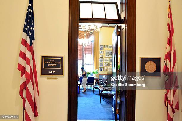 An unidentified staffer works inside the office of the late Senator Edward "Ted" M. Kennedy in the Russell Senate Office Building in Washington,...