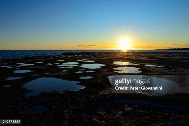 sunset at punta pardelas, peninsula valdes, province of chubut, patagonia, argentina - chubut province ストックフォトと画像