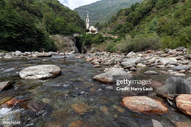 river cannobino at the end of the sant anna ravine, in the background the church of orrido sant anna, cannobio, verbano-cusio-ossola province, piedmont region, italy - province of verbano cusio ossola stock pictures, royalty-free photos & images