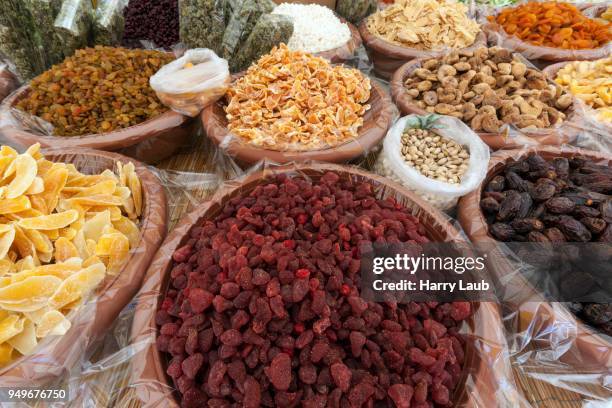 dried and candied fruits at a market stall in cannobio, lago maggiore, verbano-cusio-ossola province, piedmont region, italy - province of verbano cusio ossola stock pictures, royalty-free photos & images
