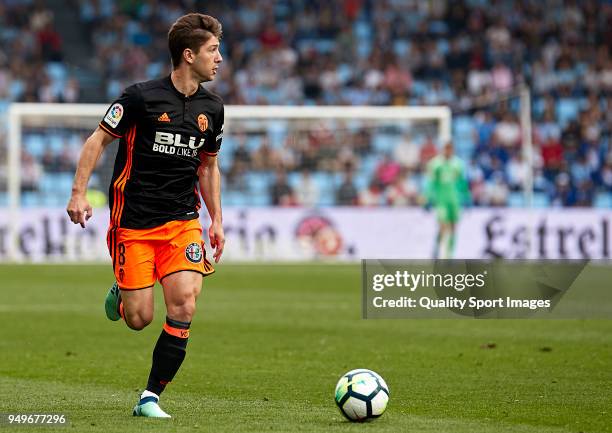 Luciano Vietto of Valencia CF in action during the La Liga match between Celta de Vigo and Valencia at Balaidos Stadium on April 21, 2018 in Vigo,...