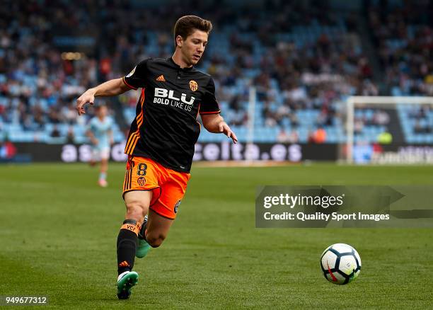 Luciano Vietto of Valencia CF in action during the La Liga match between Celta de Vigo and Valencia at Balaidos Stadium on April 21, 2018 in Vigo,...