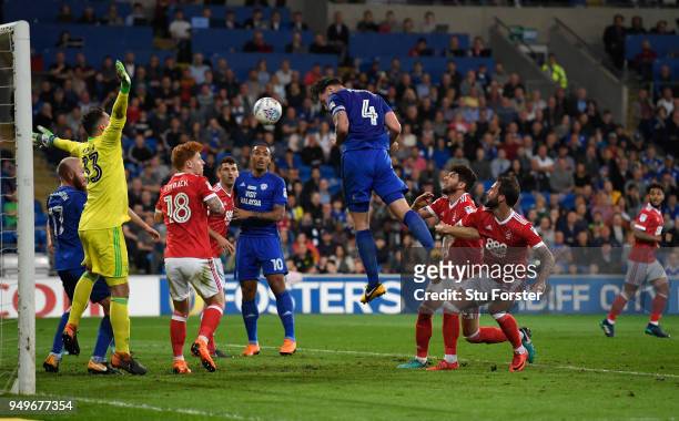 Sean Morrison of Cardiff heads the opening goal during the Sky Bet Championship match between Cardiff City and Nottingham Forest at Cardiff City...