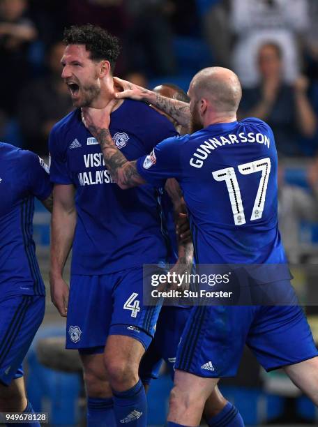 Sean Morrison of Cardiff celebrates with team mates after scoring the opening goal during the Sky Bet Championship match between Cardiff City and...