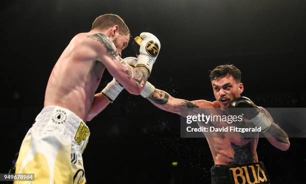 Belfast , Ireland - 21 April 2018; Tyrone McKenna, right, in action against Anthony Upton during their Super-Lightweight bout at the Boxing in SSE...