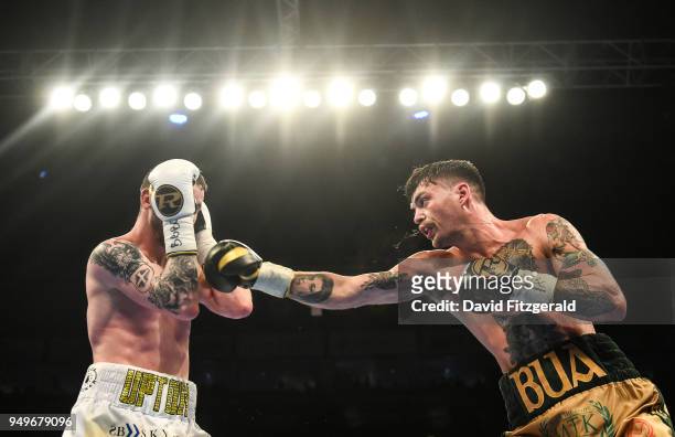 Belfast , Ireland - 21 April 2018; Tyrone McKenna, right, in action against Anthony Upton during their Super-Lightweight bout at the Boxing in SSE...