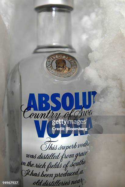 Bottle of Absolut Vodka, produced by Pernod Ricard, sits on ice in a bar in Paris, France, on Thursday, Sept. 3, 2009. Pernod Ricard SA, the world's...