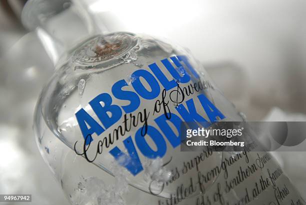 Bottle of Absolut Vodka, produced by Pernod Ricard, sits on ice in a bar in Paris, France, on Thursday, Sept. 3, 2009. Pernod Ricard SA, the world's...