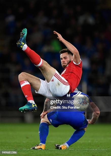 Forest player Danny Fox challenges Aron Gunnarsson of Cardiff during the Sky Bet Championship match between Cardiff City and Nottingham Forest at...