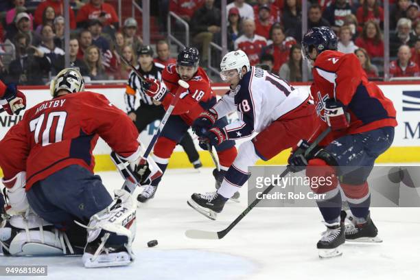 Pierre-Luc Dubois of the Columbus Blue Jackets takes a shot on goalie Braden Holtby of the Washington Capitals in the first period during Game Five...