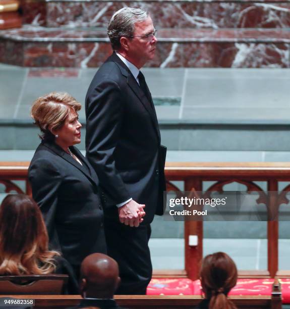 Former Governor of Florida Jeb Bush and his wife, Columba Bush, arrive to the funeral for his mother, former first lady Barbara Bush, at St. Martin's...