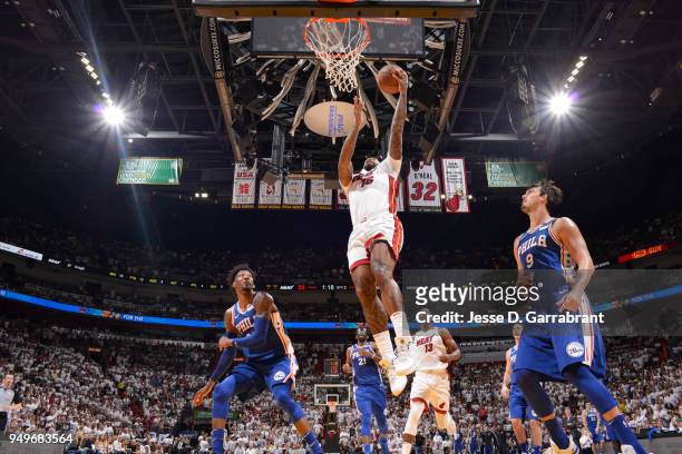 James Johnson of the Miami Heat goes to the basket against the Philadelphia 76ers in Game Four of Round One of the 2018 NBA Playoffs on April 21,...