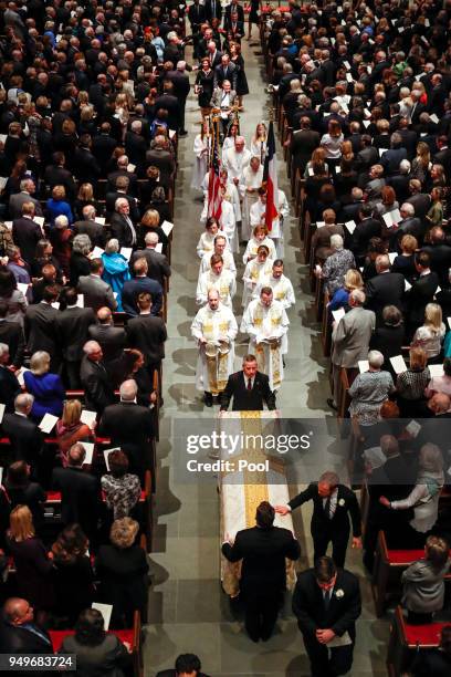 Pallbearers carry the coffin of former first lady Barbara Bush during funeral services at St. Martin's Episcopal Church on April 21, 2018 in Houston,...