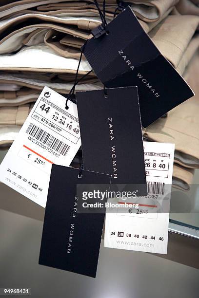 Price labels are displayed on clothes for sale in a Zara store in Madrid, Spain, on Tuesday, Sept. 15, 2009. Inditex report earnings tomorrow.