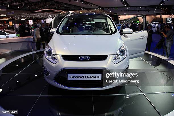 The Ford Grand C-Max automobile sits on display on the first press day of the Frankfurt Motor Show, in Frankfurt, Germany, on Tuesday, Sept. 15,...