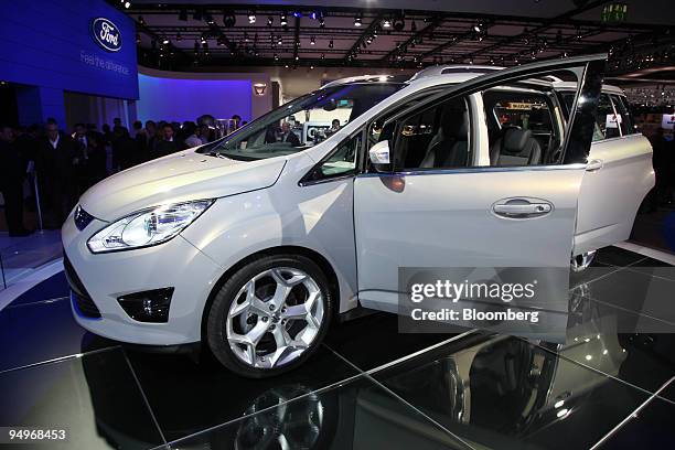 The Ford Grand C-Max automobile sits on display on the first press day of the Frankfurt Motor Show, in Frankfurt, Germany, on Tuesday, Sept. 15,...