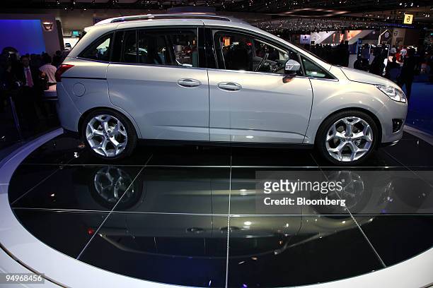 The Ford Grand C-Max automobile sits on display on the first press day of the Frankfurt Motor Show, in Frankfurt, Germany, on Tuesday, Sept. 15,...