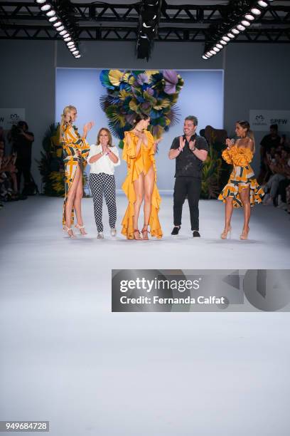 Singer Anitta ,Liana Thomaz, Renato Thomaz, and Carol Trentini walk at Agua de Coco Runway at SPFW N45 Summer 2019 at Ibirapuera's Bienal Pavilion on...