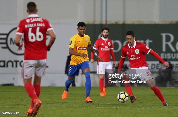Benfica defender Andre Almeida from Portugal with GD Estoril Praia defender Ailton Silva from Brazil in action during the Primeira Liga match between...
