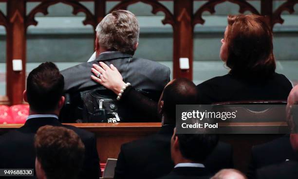 Dorothy "Doro" Bush Koch puts her arm around the shoulder of her father, former President George H.W. Bush, during the funeral for former first lady...