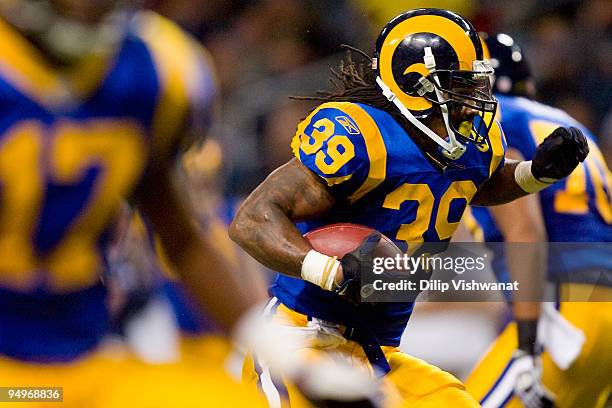 Steven Jackson of the St. Louis Rams rushes against the Houston Texans at the Edward Jones Dome on December 20, 2009 in St. Louis, Missouri.