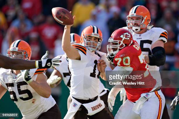 Quarterback Brady Quinn of the Cleveland Browns knocks down his own pass after it was hit back to him during a game against the Kansas City Chiefs at...