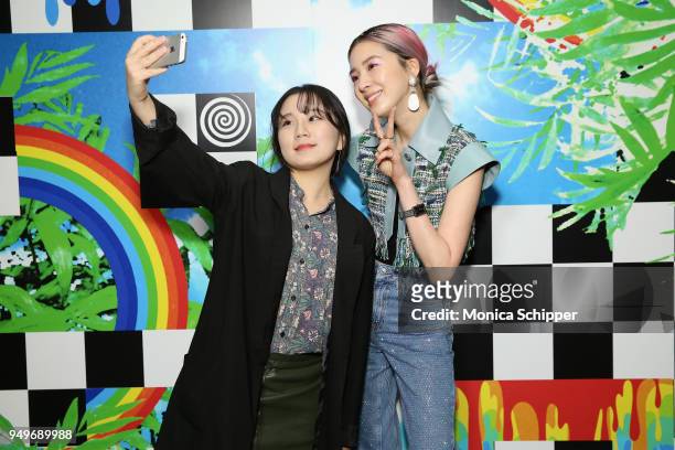 Irene Kim poses with fans during a Meet & Greet at Beautycon Festival NYC 2018 - Day 1 at Jacob Javits Center on April 21, 2018 in New York City.