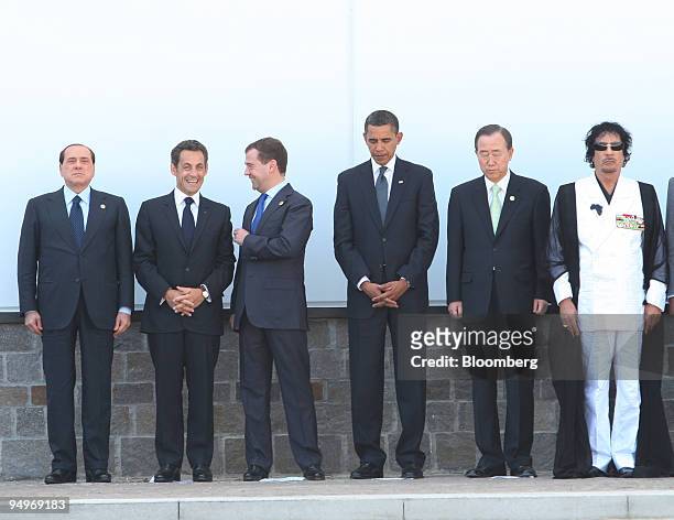 Silvio Berlusconi, Italy's prime minister, far left, stands with, from left to right, Nicolas Sarkozy, France's president, Dmitry Medvedev, Russia's...