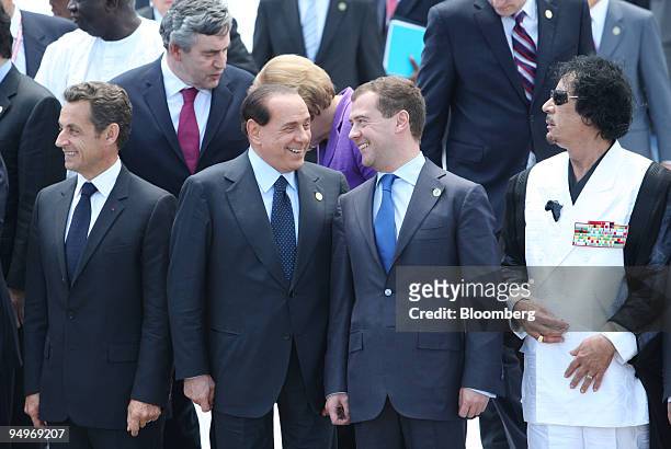 Nicolas Sarkozy, France's president, left, stands with, from left to right, Silvio Berlusconi, Italy's prime minister, Dmitry Medvedev, Russia's...