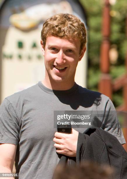 Mark Zuckerberg, chief executive officer and founder of Facebook Inc., walks outside during the Allen & Co. Media and Technology Conference in Sun...