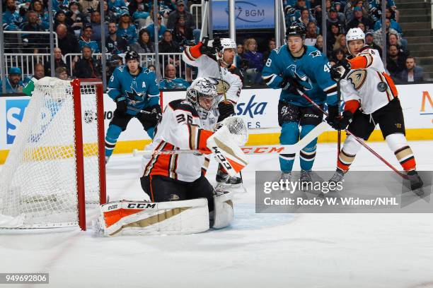 John Gibson of the Anaheim Ducks defends the net against the San Jose Sharks in Game Three of the Western Conference First Round during the 2018 NHL...