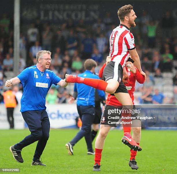 Lincoln City's Luke Waterfall celebrates scoring his sides second goal during the Sky Bet League Two match between Lincoln City and Colchester United...