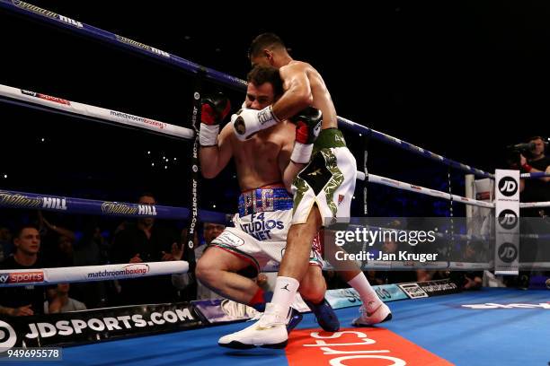 Amir Khan of England knocks out Phil Lo Greco of Italy during their Super Welterweight bout at Echo Arena on April 21, 2018 in Liverpool, England.