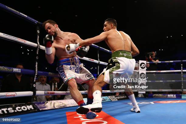 Amir Khan of England knocks out Phil Lo Greco of Italy during their Super Welterweight bout at Echo Arena on April 21, 2018 in Liverpool, England.