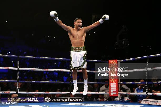 Amir Khan of England celebrates after winning his Super Welterweight bout against Phil Lo Greco of Italy at Echo Arena on April 21, 2018 in...