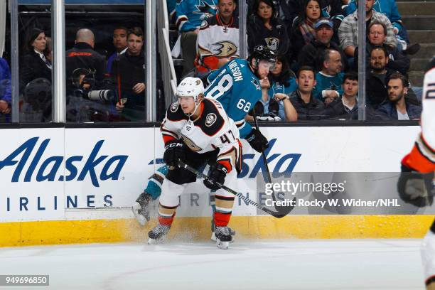 Hampus Lindholm of the Anaheim Ducks skates against Melker Karlsson of the San Jose Sharks in Game Three of the Western Conference First Round during...