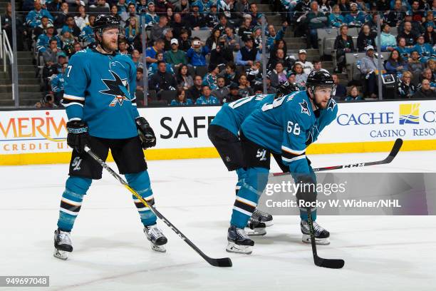 Paul Martin and Melker Karlsson of the San Jose Sharks faces off against the Anaheim Ducks in Game Three of the Western Conference First Round during...