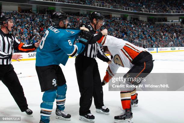 Referee steps between Joe Pavelski of the San Jose Sharks and Nick Ritchie of the Anaheim Ducks in Game Three of the Western Conference First Round...