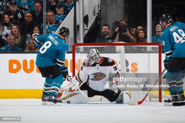 John Gibson of the Anaheim Ducks defends the net against the San Jose Sharks in Game Three of the Western Conference First Round during the 2018 NHL...