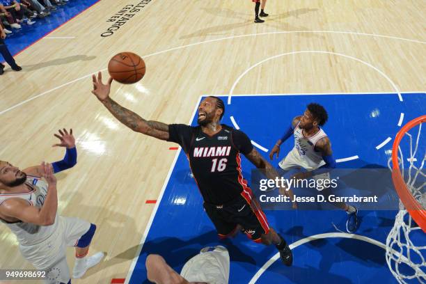 James Johnson of the Miami Heat rebounds the ball against the Philadelphia 76ers in game one of round one of the 2018 NBA Playoffs on April 14, 2018...