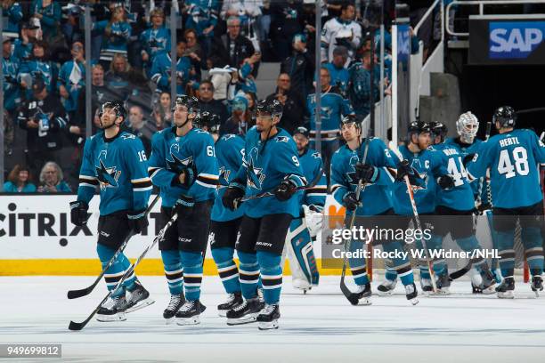 Eric Fehr, Justin Braun and Evander Kane of the San Jose Sharks celebrate after defeating the Anaheim Ducks in Game Three of the Western Conference...