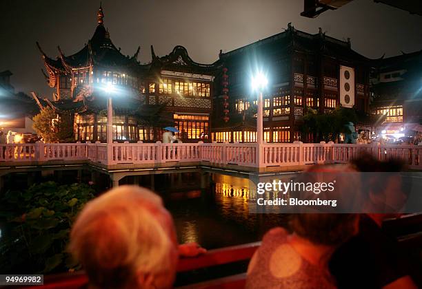 The Yu Garden is darkened by a solar eclipse in Shanghai, China, on Wednesday, July 22, 2009. The longest solar eclipse of the 21st century passed...